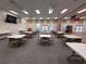 Spacious meeting room featuring tables, chairs, and modern lighting perfect for gatherings at 25527 Oak Aly, Leesburg, FL 34748