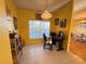 Cozy home office featuring a tile floor, window views, and a desk setup at 25527 Oak Aly, Leesburg, FL 34748