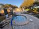 Relaxing spa with a view of surrounding landscape and spa rules visible at 25527 Oak Aly, Leesburg, FL 34748