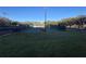 View of outdoor tennis courts featuring multiple courts for ample recreational opportunities at 25527 Oak Aly, Leesburg, FL 34748