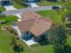 Beautiful aerial view of home featuring large roof and manicured landscaping with mature trees and shrubs at 26636 Evert St, Leesburg, FL 34748