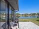 Enclosed patio offering water views and great space for entertaining at 26636 Evert St, Leesburg, FL 34748