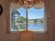 Scenic view of the lake and backyard from the dining area window at 26636 Evert St, Leesburg, FL 34748