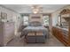 Spacious main bedroom featuring soft colors, ensuite bath, and detailed accents at 26636 Evert St, Leesburg, FL 34748