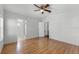 Spacious main bedroom with wood floors and ceiling fan at 27 Florence Blvd, Debary, FL 32713