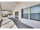 Screened porch with sliding glass door access and large windows for natural light at 27 Florence Blvd, Debary, FL 32713