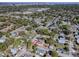 Bird's eye view showcasing the property's suburban setting with cityscape views in the distance at 2741 S Brown Ave, Orlando, FL 32806