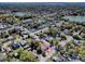 Overhead aerial shot of the home in a neighborhood near two lakes and surrounded by trees at 2741 S Brown Ave, Orlando, FL 32806