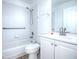 Bright bathroom featuring tile surround and an updated vanity at 2741 S Brown Ave, Orlando, FL 32806