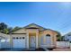 Charming single-story home with a well-maintained yard and inviting front entrance at 2741 S Brown Ave, Orlando, FL 32806