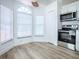 Bright kitchen features stainless steel appliances, tile floors, and plenty of natural light at 2741 S Brown Ave, Orlando, FL 32806