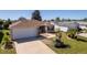 Charming single-story home with well-manicured lawn and inviting front entrance at 314 Olanta Dr, The Villages, FL 32162