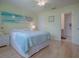 Inviting bedroom with hardwood floors and ensuite bathroom at 3337 Ashbrook Pl, The Villages, FL 32162