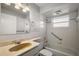 Bathroom features a bathtub and shower combination, and a sink with counter space at 33624 Dolores Ct, Leesburg, FL 34788