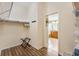 Walk-in closet with custom shelves and racks, and bathroom view at 3373 Melbourne Ln, The Villages, FL 32163
