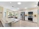 Bright kitchen with stainless steel appliances and large granite countertop island at 3373 Melbourne Ln, The Villages, FL 32163