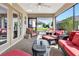 Relaxing screened patio with comfortable seating, offering a perfect spot for outdoor enjoyment at 3405 Rabbit Run Path, The Villages, FL 32163