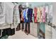 Well-organized walk-in closet features ample storage with hanging rods and drawers at 3405 Rabbit Run Path, The Villages, FL 32163