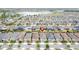 A high angle view showcases neighborhood homes, streetscapes, and pin location markers at 345 Alcove Dr, Groveland, FL 34736