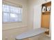 This home comes with a built in ironing board in the laundry room at 36845 Taylor Mill Rd, Fruitland Park, FL 34731