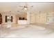 Open-concept living room with tile floor kitchen, and a front door view at 36845 Taylor Mill Rd, Fruitland Park, FL 34731