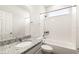 Bathroom with granite vanity, tub-shower combination, and tile surround at 37031 Lake Overlook Dr, Grand Island, FL 32735