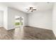 Bright bedroom with tile floors and sliding glass door to backyard at 37031 Lake Overlook Dr, Grand Island, FL 32735