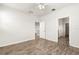 Spacious bedroom featuring tile floors and two closets at 37031 Lake Overlook Dr, Grand Island, FL 32735