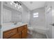 Bathroom features vanity with marble countertop, updated fixtures, and shower/tub combo at 3900 Sw 102Nd Pl, Ocala, FL 34476