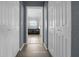 Hallway view of a bathroom featuring a black, corner soaking tub at 3900 Sw 102Nd Pl, Ocala, FL 34476