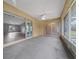 View of the porch with sliding glass doors and view of backyard at 3900 Sw 102Nd Pl, Ocala, FL 34476