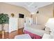 Large bedroom features a vaulted ceiling, hardwood floors, and neutral colors at 3909 River Crest Cir, Leesburg, FL 34748