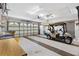 Spacious garage featuring a golf cart and ample room for parking at 3909 River Crest Cir, Leesburg, FL 34748