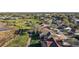 Aerial view of homes backing onto golf course at 4818 Sawgrass Lake Cir, Leesburg, FL 34748