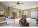 Open-concept living space offering comfortable seating, natural light, and dining area at 4818 Sawgrass Lake Cir, Leesburg, FL 34748