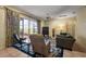 Spacious living room with tile flooring, neutral walls, slider doors to lanai, and comfortable seating at 4818 Sawgrass Lake Cir, Leesburg, FL 34748