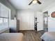Shared bedroom with two twin beds, large closet, and a dresser with ample storage space at 4857 Se 137Th Pl, Summerfield, FL 34491