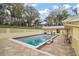 Large pool with patio area and fenced in yard at 502 Lake Gracie Dr, Eustis, FL 32726
