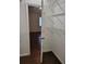 View from a walk-in closet looking out into the bedroom at 5214 Via Hacienda Cir # A308, Orlando, FL 32839