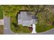 Overhead shot of home with beautiful landscaping and mature shade trees at 5402 Rosewall Cir, Leesburg, FL 34748