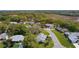 Community with lush green landscaping and well-maintained homes at 5402 Rosewall Cir, Leesburg, FL 34748