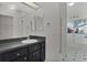 Bathroom featuring a shower, bathtub, and a vanity with a large mirror for enhanced functionality at 5402 Rosewall Cir, Leesburg, FL 34748