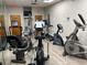 Well-equipped gym with multiple cardio machines for a complete workout at 5402 Rosewall Cir, Leesburg, FL 34748