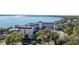 High-angle showcasing the condo building with scenic views and lush trees at 601 N Mcdonald St # 208, Mount Dora, FL 32757