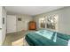Calm bedroom with a view and closet at 601 N Mcdonald St # 208, Mount Dora, FL 32757
