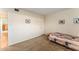 Bedroom with neutral walls and carpeted floors at 601 N Mcdonald St # 208, Mount Dora, FL 32757