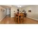 Cozy dining room adjacent to the kitchen, perfect for Gathering meals and gatherings at 601 N Mcdonald St # 208, Mount Dora, FL 32757