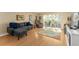 Well-lit living room with comfortable seating, stylish decor, and a relaxing ambiance at 601 N Mcdonald St # 208, Mount Dora, FL 32757