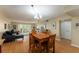 Comfortable living area with wood floors, neutral tones, and a bright, airy feel at 601 N Mcdonald St # 208, Mount Dora, FL 32757