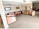 Comfortable lounge featuring ample seating with soft couches, side tables and serene atmosphere at 601 N Mcdonald St # 208, Mount Dora, FL 32757